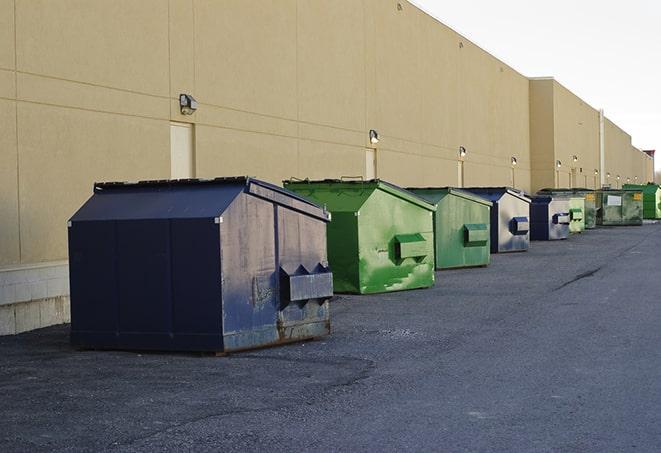 construction dumpsters stacked in a row on a job site in Downers Grove